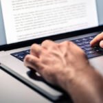 Writing text document, online content, book, letter or essay. Writer, journalist or freelance columnist with laptop. Resume, news article, report or college application. Freelancer, editor or employee